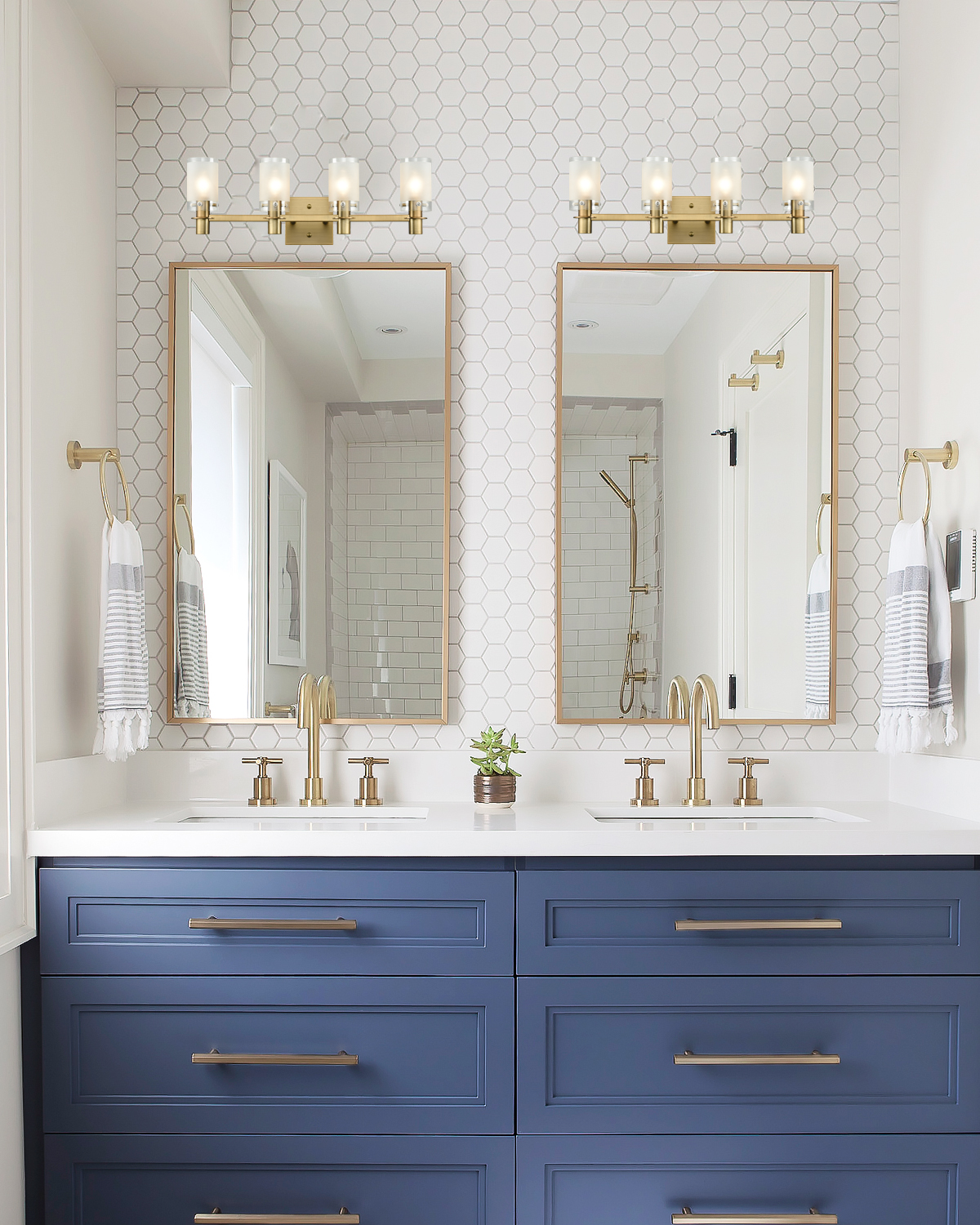 white and black bathroom // brass hardware // brass and glass